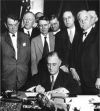 President Roosevelt signs the ...